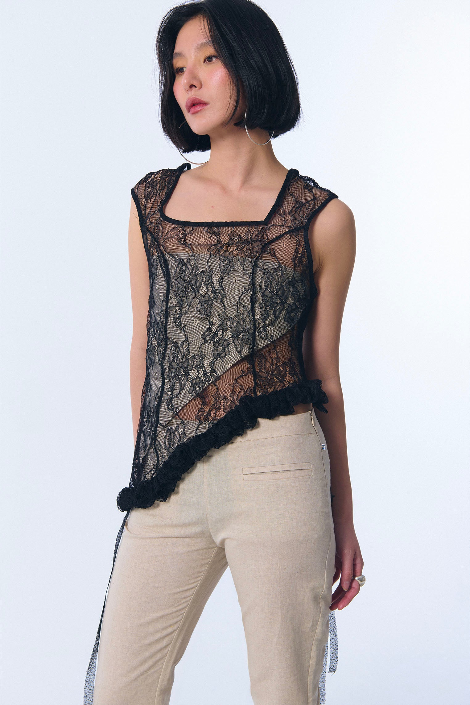 Top "memoria" en encaje negro
